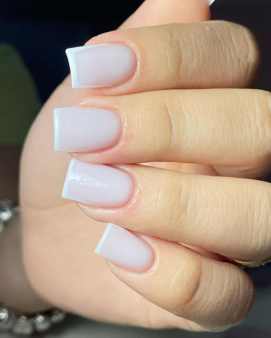 Close-up of a pale manicure at Jessica Nails