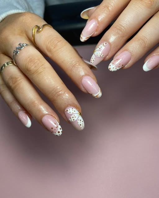 White and gold detailed nail art